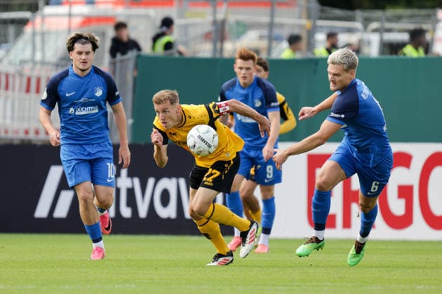 23.08.2026, xgrfx, Fussball DFB Pokal 1.Runde, SV Westfalia Rhynern - Dynamo Dresden v.l. Niklas Hauptmann (Dynamo Dresden), Julius Woitascheck (SV Westfalia Rhynern) (DFL DFB REGULATIONS PROHIBIT ANY USE OF PHOTOGRAPHS as IMAGE SEQUENCES and or QUASI-VIDEO) Münster *** August 23, 2026, xgrfx, Soccer DFB Cup 1st Round, SV Westfalia Rhynern vs. Dynamo Dresden, Niklas Hauptmann (Dynamo Dresden), Julius Woitascheck (SV Westfalia Rhynern). DFL and DFB regulations prohibit any use of photographs as image sequences and or quasi-video. Münster