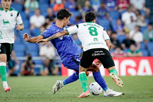 August 23, 2026, Getafe, Madrid, Spain: Gustavo Puerta of Real Racing Club and Ramon Terrats of Getafe CF in action during the Spanish League, LaLiga EA Sports, football match played between Getafe CF and Real Racing Club de Santander at Coliseum de Getafe stadium on August 23, 2026, in Getafe, Madrid, Spain. Getafe Spain - ZUMAa181 20260823_zaa_a181_135 Copyright: xAngelxPerezxMecax