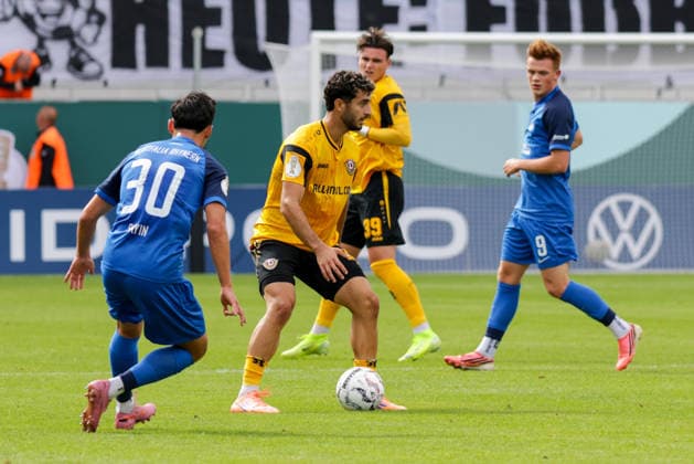 23.08.2026, xgrfx, Fussball DFB Pokal 1.Runde, SV Westfalia Rhynern - Dynamo Dresden v.l. Melih Sayin (SV Westfalia Rhynern), Kaan Inanoglu (Dynamo Dresden) (DFL DFB REGULATIONS PROHIBIT ANY USE OF PHOTOGRAPHS as IMAGE SEQUENCES and or QUASI-VIDEO) Münster *** August 23, 2026, xgrfx, Soccer DFB Cup First Round, SV Westfalia Rhynern vs. Dynamo Dresden, Melih Sayin (SV Westfalia Rhynern), Kaan Inanoglu (Dynamo Dresden). DFL and DFB regulations prohibit any use of photographs as image sequences and or quasi-video. Münster