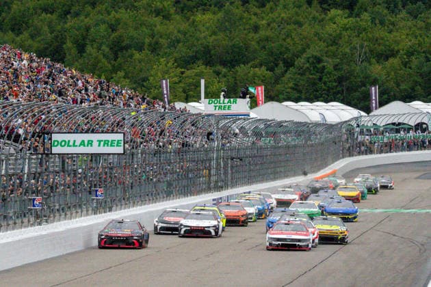 LOUDON, NH - AUGUST 23: Tyler Reddick ( 45 23XI Racing Chumba Casino Toyota) leads the field into turn 1 to start the NASCAR, Motorsport, USA Cup Series Dollar Tree 301 on August 23, 2026, at New Hampshire Motor Speedway in Loudon, NH. (Photo by David Hahn Icon Sportswire) AUTO: AUG 23 NASCAR Cup Series Dollar Tree 301 EDITORIAL USE ONLY Icon260823006