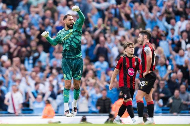 Gianluigi Donnarumma of Manchester City celebrates his teams 2nd goal after VAR review in front of Ben Gannon-Doak (middle) and Adam Smith (c) (right) Manchester City v Bournemouth, Premier League, Football, Etihad Stadium, Manchester, UK - 23 Aug 2026Manchester Etihad Stadium United Kingdom EDITORIAL USE ONLY No use with unauthorised audio, video, data, fixture lists, club league logos or live services. Online in-match use limited to 120 images, no video emulation. No use in betting, games or single club league player publications.  Copyright: xWiredxPhotos Shutterstockx 17113667ef