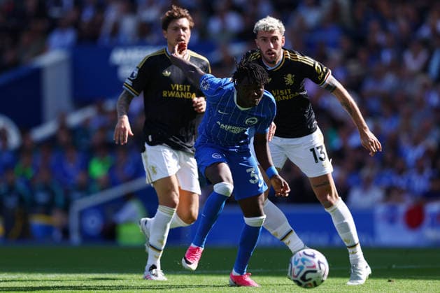 Brighton and Hove, England, 23rd August 2026. Zadok Yohanna of Brighton & Hove Albion with the ball ahead of Matteo Ruggeri of Aston Villa during the Brighton and Hove Albion vs Aston Villa Premier League match at the AMEX Stadium, Brighton and Hove. Picture credit should read: Paul Terry Sportimage EDITORIAL USE ONLY. No use with unauthorised audio, video, data, fixture lists, club league logos or live services. Online in-match use limited to 120 images, no video emulation. No use in betting, games or single club league player publications. SPI_115_PT_Brighton_Villa SPI-4931-0118