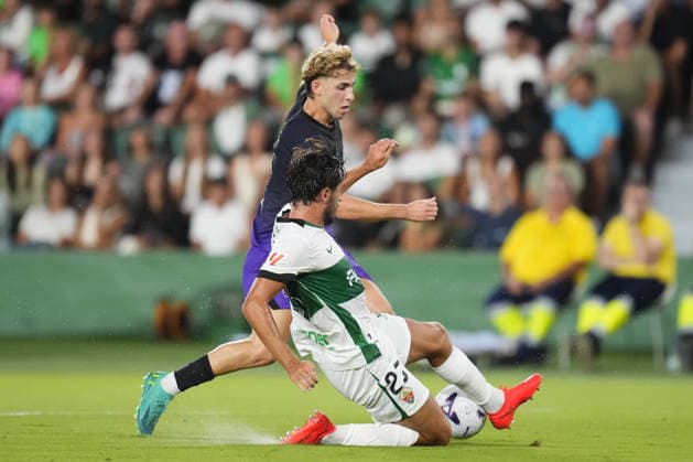 Elche CF v FC Barcelona, Barca - LaLiga ELCHE, SPAIN - AUGUST 23: Fermin Lopez central midfield of Barcelona and Spain and Víctor Chust centre-back of Elche and Spain compete for the ball during the La Liga EA Sports 2026 27 match between Elche CF and FC Barcelona at Estadio Manuel Martinez Valero on August 23, 2026 in Elche, Spain. Jose Hernandez Anadolu Elche Spain. Editorial use only. Please get in touch for any other usage.  Copyright: x2026xAnadoluxJosexHernandezx