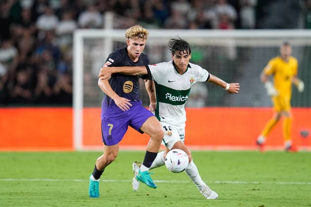 August 23, 2026, Elche, Elche, Spain: Fermin Lopez of FC Barcelona, Barca and Gonzalo Villar of Elche CF compete for the ball during the Spanish League, LaLiga EA Sports, football match played between Elche CF and FC Barcelona at Estadio Manuel Martinez Valero on August 23, 2026, in Elche, Spain. Elche CF V FC Barcelona - LaLiga EA Sports  - ZUMAa181 20260823_zaa_a181_176 Copyright: xDennisxAgyemanx