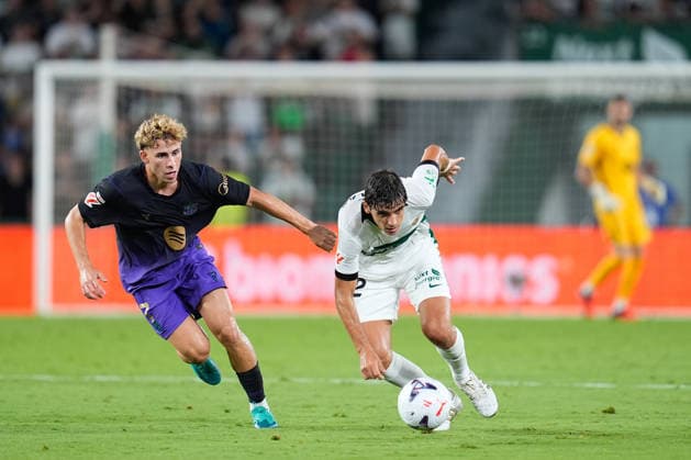 August 23, 2026, Elche, Elche, Spain: Fermin Lopez of FC Barcelona, Barca and Gonzalo Villar of Elche CF compete for the ball during the Spanish League, LaLiga EA Sports, football match played between Elche CF and FC Barcelona at Estadio Manuel Martinez Valero on August 23, 2026, in Elche, Spain. Elche Spain - ZUMAa181 20260823_zaa_a181_229 Copyright: xDennisxAgyemanx