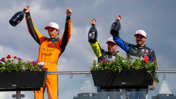 August 23, 2026: Christian Lundgaard, driver of the 7 Arrow McLaren IndyCar, Indy Car, IRL, USA Team Chevrolet, Will Power, driver of the 26 Andretti Honda, and Kyle Kirkwood, driver of the 27 Andretti Honda celebrate with champagne after the NTT INDYCAR Series Freedom 250 on August 22, 2026 on the streets of Washington, DC. CSM Washington Dc USA - ZUMAc04_ 20260823_zma_c04_104 Copyright: xJustinxCooperx