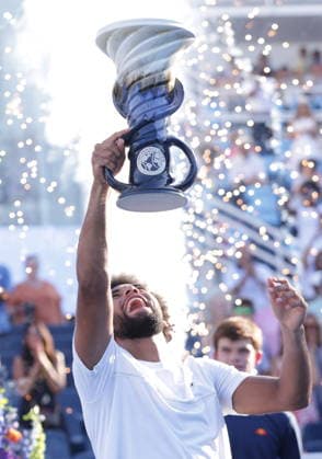 Cincinatti Open tennis tournament Arthur Fils of France holds up the Rookwood Trophy after defeating Frances Tiafoe of the USA after their final match of the Cincinnati Open tennis tournament in Cincinnati, Ohio, USA, 23 August 2026. CINCINNATI OHIO UNITED STATES  Copyright: xMARKxLYONSx