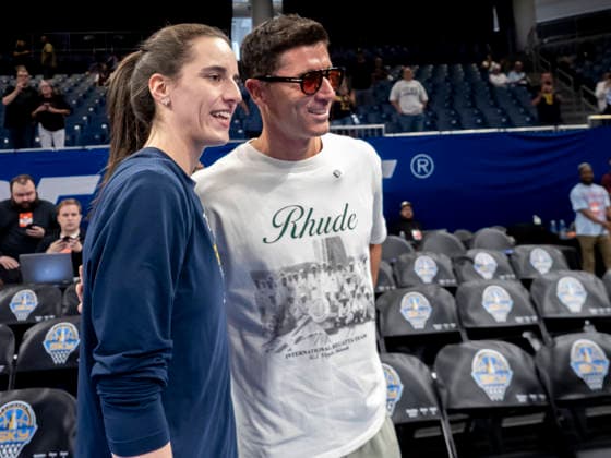 CHICAGO, IL - AUGUST 23: Caitlin Clark 22 of the Indiana Fever takes a photo with Robert Lewandowski of FC Barcelona, Barca during warms up before the regular season WNBA, Basketball Damen, USA game between the Indiana Fever and the Chicago Sky on August 23, 2026 at the Wintrust Arena in Chicago, Illinois. (Photo by Joseph Weiser Icon Sportswire) WNBA: AUG 23 Indiana Fever at Chicago Sky EDITORIAL USE ONLY Icon260823014