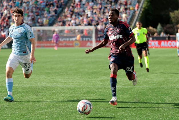 FOXBOROUGH, MA - AUGUST 23: Alhassan Yusuf 80 of the New England Revolution drives past Jonathan Shore 32 of the New York City Football Club during a match between the New England Revolution and New York City FC on August 23, 2026, at Gillette Stadium in Foxborough, Massachusetts. (Photo by Fred Kfoury III Icon Sportswire) SOCCER: AUG 23 MLS, Fussball Herren, USA New England Revolution vs New York City FC EDITORIAL USE ONLY Icon482260823003