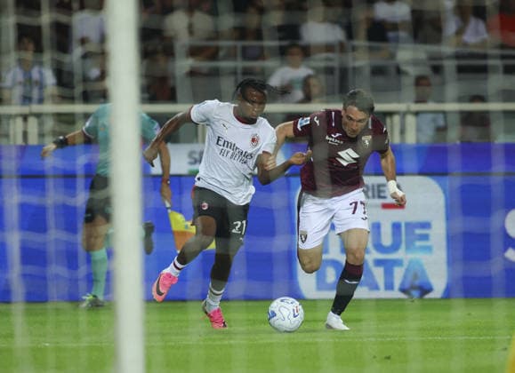 SOCCER - Serie A - Torino FC vs. AC Milan Photo by IPA ABACAPRESS.COM87741367 - Samuel Chukwueze of AC Milan and Alessio Cacciamani of Torino FC during the 2026 27 Coppa Italia soccer match between Torino FC and Carrarese Calcio 1908 on August 23, 2026, at the Stadio Olimpico Grande Torino, Turin, Italy. Photo by Nderim KACELI Turin Italy  Copyright: xIPAxSport ABACAx