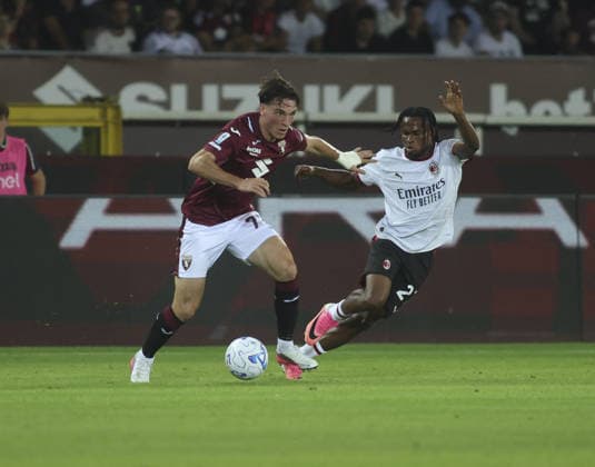 SOCCER - Serie A - Torino FC vs. AC Milan Photo by IPA ABACAPRESS.COM87741376 - Alessio Cacciamani of Torino FC and Samuel Chukwueze of AC Milan during the 2026–27 Coppa Italia soccer match between Torino FC and Carrarese Calcio 1908 on August 23, 2026, at the Stadio Olimpico Grande Torino, Turin, Italy. Photo by Nderim KACELI Turin Italy  Copyright: xIPAxSport ABACAx