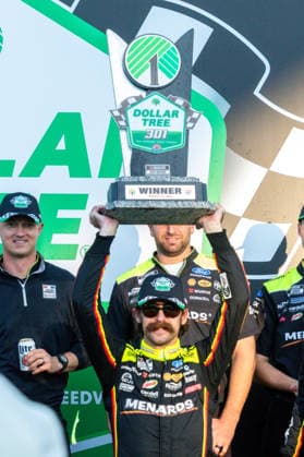 LOUDON, NH - AUGUST 23: Ryan Blaney ( 12 Team Penske Menards Dutch Boy Ford) hoists the trophy after winning the NASCAR, Motorsport, USA Cup Series Dollar Tree 301 on August 23, 2026, at New Hampshire Motor Speedway in Loudon, NH. (Photo by David Hahn Icon Sportswire) AUTO: AUG 23 NASCAR Cup Series Dollar Tree 301 EDITORIAL USE ONLY Icon260823023