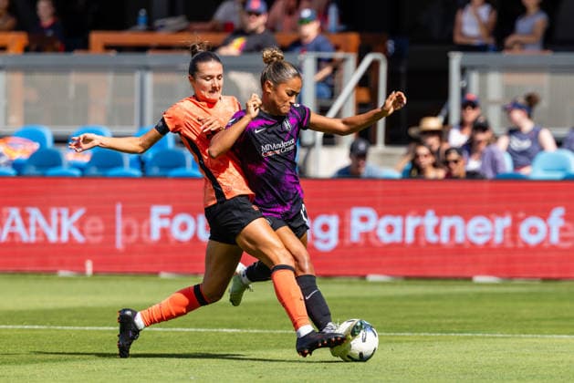 SAN JOSE, CA - AUGUST 23: Sydney Collins 16 of Bay FC and Kiki Van Zanten 12 of the Houston Dash battle for the ball during NWSL match on August 23, 2026 at PayPal Park in San Jose, CA. (Photo by Matthew Huang Icon Sportswire) SOCCER: AUG 23 NWSL Bay FC vs Houston Dash EDITORIAL USE ONLY Icon260823007