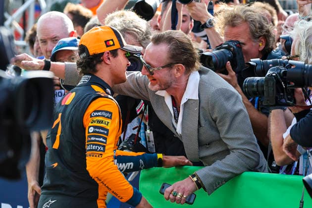 August 23, 2026, Zandvoort, Kaohsiung City, Netherlands: LANDO NORRIS of McLaren F1 Team receives a congratulatory embrace following the 2026 Formula 1 Dutch Grand Prix. Zandvoort Netherlands - ZUMAh201 20260823_zsp_h201_066 Copyright: xYichinxHoux