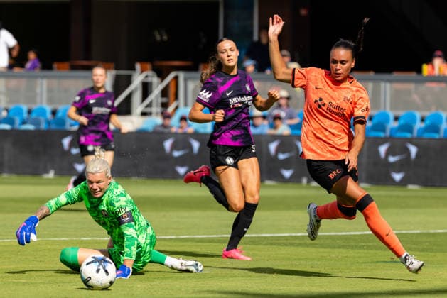 SAN JOSE, CA - AUGUST 23: Karlie Lema 5 of Bay FC kicks the ball past Jane Campbell 1 of the Houston Dash during NWSL match on August 23, 2026 at PayPal Park in San Jose, CA. (Photo by Matthew Huang Icon Sportswire) SOCCER: AUG 23 NWSL Bay FC vs Houston Dash EDITORIAL USE ONLY Icon260823011
