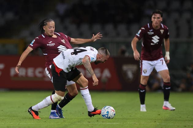 Torino v AC Milan - Serie A - Stadio Grande Torino Turin, Italy, 23rd August 2026. Alessio Cacciamani of Torino FC looks on as team mate Kian Franklin Fitz Jim challenges Mario Gila of AC Milan during the Torino vs AC Milan Serie A match at Stadio Grande Torino, Turin. Picture credit should read: Jonathan Moscrop Turin Stadio Olimpico Grande Torino Italy