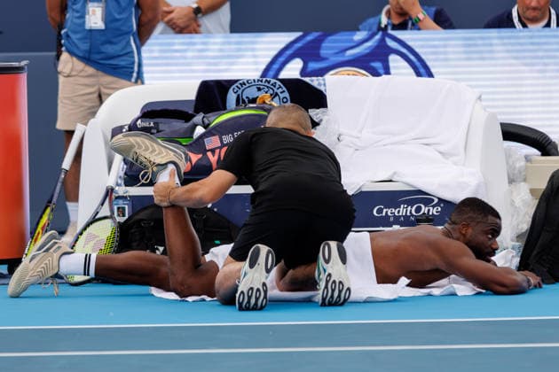 August 23, 2026, Mason, Ohio, U.S: Frances Tiafoe (USA) gets treatment from a trainer between sets during the MenÃ¢â‚¬â ¢s Championship of the Cincinnati Open at the Lindner Family Tennis Center , Mason, Oh. Mason U.S - ZUMAs304 20260823_zaf_s304_039 Copyright: xScottxStuartx