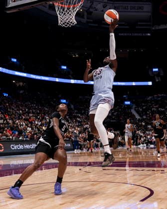 August 23, 2026, Vancouver, Bc, CANADA: Toronto Tempo s Ornella Bankole (33) lays up while Las Vegas Aces Ta Niya Latson (5) watches during the second half of a WNBA, Basketball Damen, USA basketball game, in Vancouver, on Sunday Aug. 23, 2026. Canada News - August 23, 2026  - ZUMAc35_ 20260823_zaf_c35_193 Copyright: xJacobxMallarix