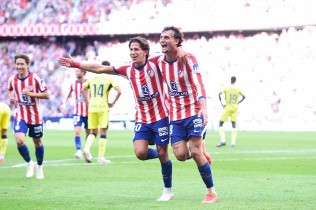 (260824) -- MADRID, Aug. 24, 2026 -- Madrid s Marc Pubill (R) celebrates scoring their first goal with Giuliano Simeone during the Spanish La Liga football match between Atletico de Madrid and Villarreal at Metropolitano stadium in Madrid, Spain, Aug. 23, 2026. (Photo by Xinhua) (SP)SPAIN-MADRID-FOOTBALL-LALIGA-ATLETICO DE MADRID VS VILLARREAL GustavoxValiente 