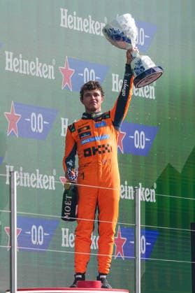 (260824) -- ZANDVOORT, Aug. 24, 2026 -- McLaren s British driver Lando Norris celebrates with the trophy during the awarding ceremony after the Formula 1 Dutch Grand Prix Race at Zandvoort Circuit, near Amsterdam, the Netherlands, Aug. 23, 2026. ) (SP)NETHERLANDS-ZANDVOORT-F1-DUTCH GRAND PRIX PengxZiyang 