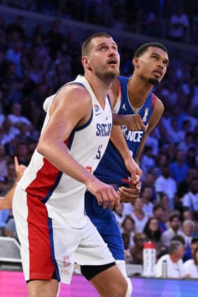 Victor Wembanyama and Nikola Jokic during the 2027 World Cup warm-up match between France and Serbia at the CO™MET Arena in OrlÃ ans on 23 August 2026. - 23 08 2026 - France France OrlÃ ans -  JulienxMattiax xLexPictorium LePictorium_0339395