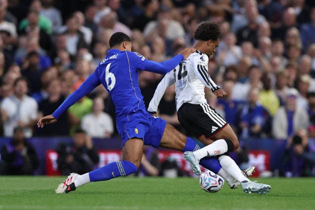 London, England, 24th August 2026. Oscar Bobb of Fulham is fouled by Levi Colwill of Chelsea who is then shown a yellow card during the Fulham vs Chelsea Premier League match at Craven Cottage, London. Picture credit should read: David Klein Sportimage EDITORIAL USE ONLY. No use with unauthorised audio, video, data, fixture lists, club league logos or live services. Online in-match use limited to 120 images, no video emulation. No use in betting, games or single club league player publications. SPI_050_DK_Fulham_Chelsea SPI-4933-0050