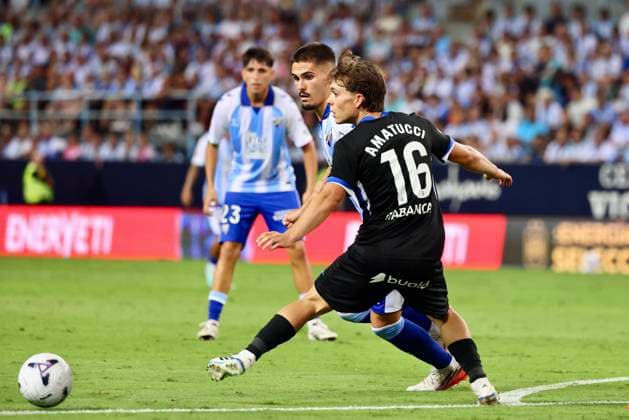 ESP: LaLiga EA Sports Malaga CF v Deportivo La Coruna Carlos Ruiz Chupete of Malaga and Amatucci of Deportivo la coruna during LaLiga EA Sports match between Malaga CF v Deportivo La Coruna played at La Rosaleda Stadium, Malaga on August 24 2026 in Spain Spain Soccer *** ESP LaLiga EA Sports Málaga CF vs. Deportivo La Coruna: Carlos Ruiz Chupete of Málaga and Amatucci of Deportivo La Coruna during the LaLiga EA Sports match between Málaga CF and Deportivo La Coruna, played at La Rosaleda Stadium in Málaga on August 24, 2026, in Spain. Spanish Soccer Copyright: xAgenciaxLOFx