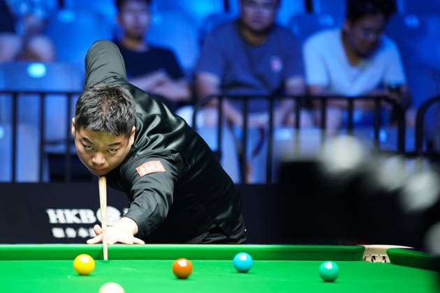 WUHAN, CHINA - AUGUST 25: Pang Junxu of China plays a shot in the third round match against Shaun Murphy of England on day 3 of Wuhan Open 2026 at the Optics Valley Gymnasium of Huazhong University of Science and Technology on August 25, 2026 in Wuhan, Hubei Province of China.  Copyright: xTaixChengzhex 111662030994