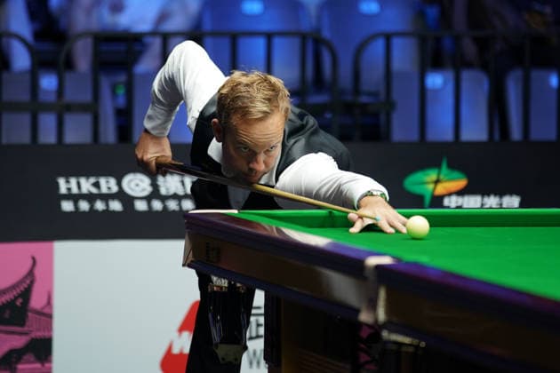 WUHAN, CHINA - AUGUST 25: Ali Carter of England plays a shot in the third round match against Kyren Wilson of England on day 3 of Wuhan Open 2026 at the Optics Valley Gymnasium of Huazhong University of Science and Technology on August 25, 2026 in Wuhan, Hubei Province of China.  Copyright: xTaixChengzhex 111662031236