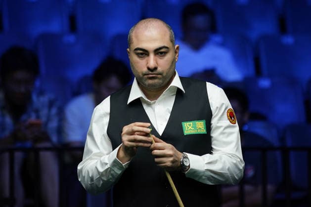 WUHAN, CHINA - AUGUST 25: Hossein Vafaei of Iran chalks the cue in the third round match against Neil Robertson of Australia on day 3 of Wuhan Open 2026 at the Optics Valley Gymnasium of Huazhong University of Science and Technology on August 25, 2026 in Wuhan, Hubei Province of China.  Copyright: xTaixChengzhex 111662072242