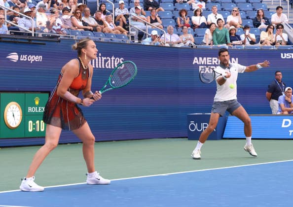 August 25, 2026, New York City, New York, USA: NOVAK DJOKOVIC (Serbia) and ARYNA SABALENKA during the match mixed doubles round 1 16 final of US Open against H. Patten (Great Britain) and K. Siniakova (Czech Republic). New York, USA. Tennis: US Open - Aryna Sabalenka, Novak Djokovic Double Mix  - ZUMAc278 20260825_zsp_c278_017 Copyright: xMarcinxCholewinskix