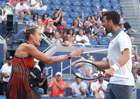 August 25, 2026, New York City, New York, USA: NOVAK DJOKOVIC (Serbia) and ARYNA SABALENKA during the match mixed doubles round 1 16 final of US Open against H. Patten (Great Britain) and K. Siniakova (Czech Republic). New York, USA. Tennis: US Open - Aryna Sabalenka, Novak Djokovic Double Mix  - ZUMAc278 20260825_zsp_c278_019 Copyright: xMarcinxCholewinskix