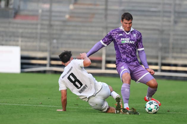 Toto-Pokal; SV Wacker Burghausen - FC Ingolstadt 04; Zweikampf Kampf um den Ball Simon Lorenz (32, FCI) Ben Hagmeyer (8 SVWB) Toto-Pokal - SV Wacker Burghausen - FC Ingolstadt 04 Saison 2026 2027 *** Toto Cup: SV Wacker Burghausen vs. FC Ingolstadt 04; Tackle; Battle for the Ball; Simon Lorenz 32, FCI Ben Hagmeyer 8; SVWB Toto Cup: SV Wacker Burghausen vs. FC Ingolstadt 04; 2026–2027 Season