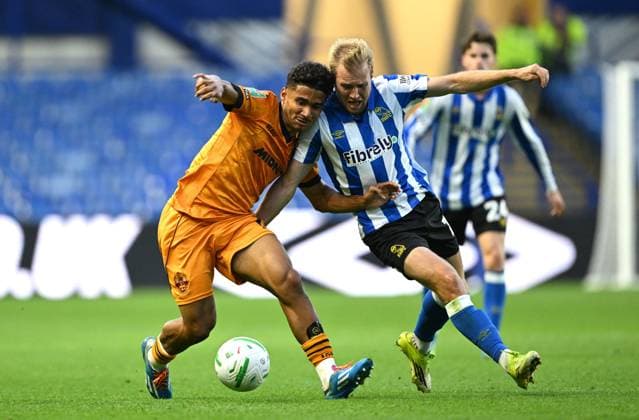 Pedro Lima of Wolverhampton Wanderers and Billy Mitchell of Sheffield Wednesday Sheffield Wednesday v Wolverhampton Wanderers, EFL Carabao Cup, Second Round, Football, Hillsborough, Sheffield, UK - 25 Aug 2026Sheffield Hillsborough United Kingdom EDITORIAL USE ONLY No use with unauthorised audio, video, data, fixture lists, club league logos or live services. Online in-match use limited to 120 images, no video emulation. No use in betting, games or single club league player publications. Copyright: xGreigxCowie Shutterstockx 17114999ah