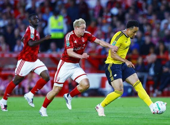 Noah Okafor of Leeds United and Xaver Schlager of Nottingham Forest Nottingham Forest v Leeds United, EFL Carabao Cup, Second Round, Football, City Ground, Nottingham, UK - 25 Aug 2026Nottingham City Ground United Kingdom EDITORIAL USE ONLY No use with unauthorised audio, video, data, fixture lists, club league logos or live services. Online in-match use limited to 120 images, no video emulation. No use in betting, games or single club league player publications. Copyright: xMattxWest Shutterstockx 17115032ag
