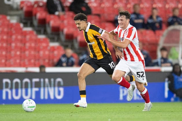 Stoke City v Hull City Carabao Cup Mohamed Belloumi of Hull City takes on Laurence Giani of Stoke City during the Carabao Cup Second Round match between Stoke City and Hull City at the bet365 Stadium, Stoke-on-Trent 25 08 2026 UK Newspapers OUT Copyright: xMattxWilkinsonx FIL-23823-0217