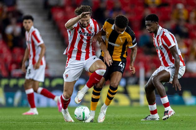 25th August 2026; Bet365 Stadium, Stoke, Staffordshire, England; Carabao Cup Football, Stoke City versus Hull City; Sam Gallagher of Stoke City under pressure from Tyrell Sellars-Fleming of Hull City TimxWilliams