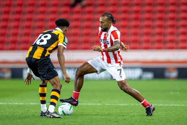 25th August 2026; Bet365 Stadium, Stoke, Staffordshire, England; Carabao Cup Football, Stoke City versus Hull City; Sorba Thomas of Stoke City under pressure from Cody Drameh of Hull City TimxWilliams
