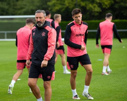 Rangers manager Derek McInnes and Vanja Dragojevic at training ahead of tomorrow s UEFA Conference League qualifying match against Jablonec. Rangers Training - The Rangers Training Centre, Glasgow, Lanarkshire, Scotland, UK - 26 Aug 2026Glasgow The Rangers Training Centre Lanarkshire United Kingdom  Copyright: xO Rourke RangersxFC Shutterstockx 17117524s