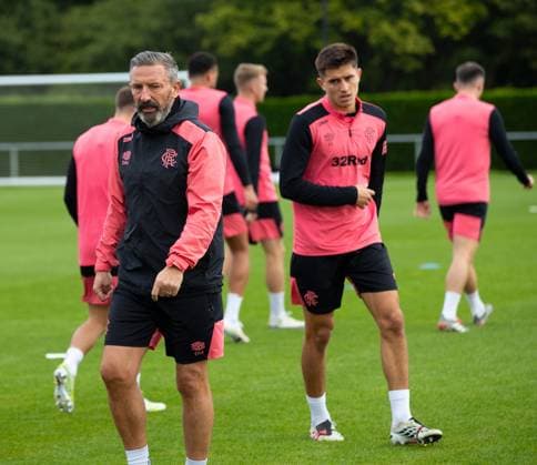 Rangers manager Derek McInnes and Vanja Dragojevic at training ahead of tomorrow s UEFA Conference League qualifying match against Jablonec. Rangers Training - The Rangers Training Centre, Glasgow, Lanarkshire, Scotland, UK - 26 Aug 2026Glasgow The Rangers Training Centre Lanarkshire United Kingdom  Copyright: xO Rourke RangersxFC Shutterstockx 17117524t
