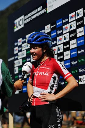 2026 UCI Mountain Bike World Championships Picture by Alex Whitehead SWpix.com - 26 08 2026 - Cycling - 2026 UCI Mountain Bike World Championships - Val di Sole, Trentino, Italy - E-mountain bike (E-MTB) Cross Country - Women Elite - Anna Spielmann (Austria) being interviewed Copyright: x xSWpix.comx(t axPhotographyxHubxLtd)xAlexxWhitehead SWpix.comx SWP-3030-19428