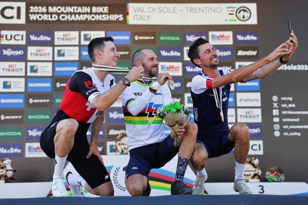 2026 UCI Mountain Bike World Championships Picture by Alex Whitehead SWpix.com - 26 08 2026 - Cycling - 2026 UCI Mountain Bike World Championships - Val di Sole, Trentino, Italy - E-mountain bike (E-MTB) Cross Country - Men Elite Podium - Jerome Gilloux (France) wins the Gold Medal to become World Champion with Joris Ryf (Switzerland) receiving the Silver Medal and Stephane Tempier (France) receiving the Bronze Medal taking a selfie Copyright: x xSWpix.comx(t axPhotographyxHubxLtd)xAlexxWhitehead SWpix.comx SWP-3030-19501