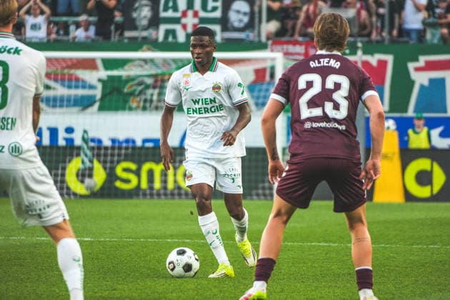 Fussball: Österreich: UEFA Conference League 2026 2027 - Play-offs - Rückspiel, 26.08.2026 - SK Rapid Wien (Österreich) vs. Heart of Midlothian FC (Hearts - Schottland) - Weststadion (Wien, Österreich); Romeo Amane (SK Rapid Wien) Copyright: xLukasxBierederx