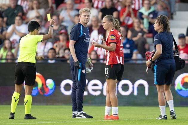 EINDHOVEN , 26-08-2026 , de Herdgang Stadium , Champions League women , knockout phase match 1 of 2 , season 2026 2027 , PSV - HB Koge , picture shows PSV women player Lore Jacobs gets yellow card from referee Catarina Campos PSV - HB Koge (women)  x206067950x Copyright: