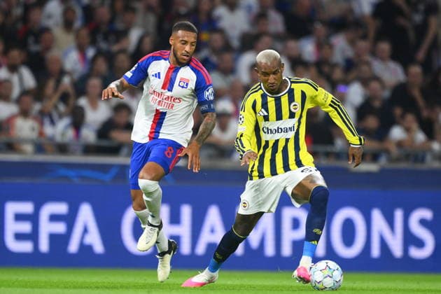 Olympique Lyon v Fenerbahce - UEFA Champions League LYON, FRANCE - AUGUST 26: Talisca (94) of Fenerbahce in action against Corentin Tolisso (L) of Olympique Lyon during the UEFA Champions League play-off second-leg match between Olympique Lyon and Fenerbahce at Groupama Stadium in Lyon, France on August 26, 2026. Arif Hudaverdi Yaman Anadolu Lyon France. Editorial use only. Please get in touch for any other usage.  Copyright: x2026xAnadoluxArifxHudaverdixYamanx