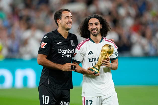 August 26, 2026, Madrid, Madrid, Spain: Marc Cucurella of Real Madrid CF and Mikel Oyarzabal of Real Sociedad pose for photo with the World Champions trophy during the Spanish League, LaLiga EA Sports, football match played between Real Madrid and Real Sociedad at Bernabeu stadium on August 26, 2026, in Madrid, Spain. Madrid Spain - ZUMAa181 20260826_zaa_a181_085 Copyright: xOscarxJ.xBarrosox