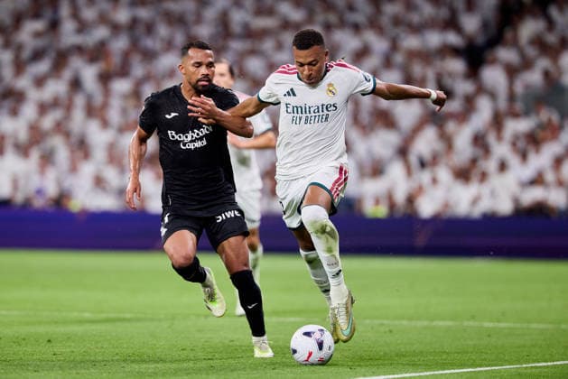 August 26, 2026, Madrid, Madrid, Spain: Kylian Mbappe of Real Madrid CF and Yangel Herrera of Real Sociedad during La Liga football match between Real Madrid CF and Real Sociedad at Santiago Bernabeu Stadium in Madrid, Spain, August 26, 2026 Soccer 2026: Real Madrid CF Vs Real Sociedad  - ZUMAa206 20260826_zsp_a206_070 Copyright: xRubenxAlbarranx