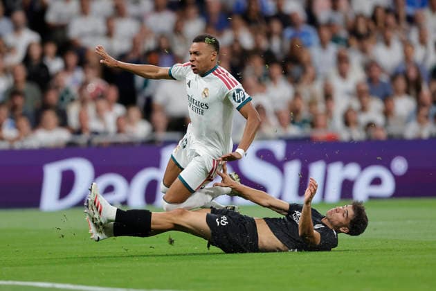 RECORD DATE NOT STATED Kylian Mbappe (Real Madrid CF) and Jon Martin (Real Sociedad) battle for the ball during the LaLiga EA Sports match between Real Madrid CF and Real Sociedad de Futbol at Estadio Santiago BernabÃ u on August 26, 2026 in Madrid, Spain. (Photo by Manu Reino DeFodi Images) -