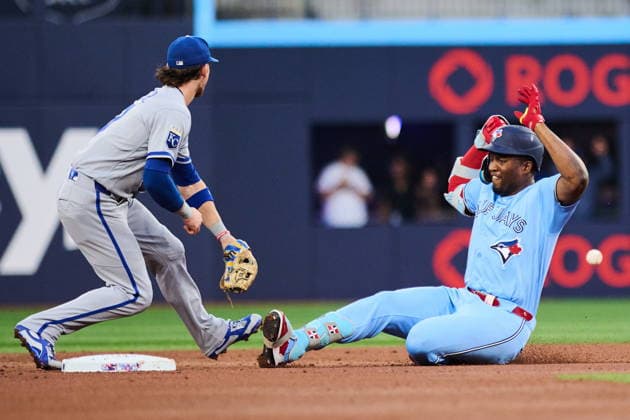 August 26, 2026, Toronto, On, Canada: Toronto Blue Jays Jesus Sanchez (12) slides into second base with a double as Kansas City Royals shortstop Bobby Witt Jr. (7) defends during second inning MLB, Baseball Herren, USA baseball action in Toronto, on Wednesday, Aug. 26, 2026. Canada News - August 26, 2026 - ZUMAc35_ 20260826_zaf_c35_060 Copyright: xSammyxKoganx