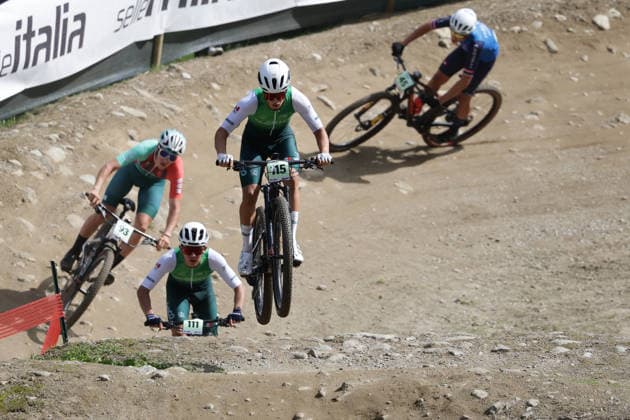 27.08.2026, Daolasa di Commezzadura, Val di Sole Bikeland, 2026 UCI MTB World Championship, WM, Weltmeisterschaft Men Junior s XCO (Cross Country Olympic) Jose Emilio Rodriguez Delgado 115 (MEX), Julio Cesar Ibarra Luna 111 (MEX), Benedek Berencsi 93 (HUN) and Giovanni Bosio 45 (ITA) Daolasa di Commezzadura Val di Sole Bikeland Trento Italy Copyright: xJustPictures.ch FrancescoxMinghettix jp-en-FrMi-MNG_0093